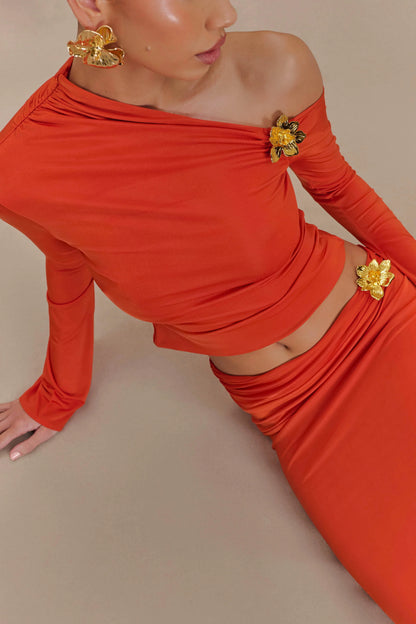 Ainsley Asymmetrical Long Sleeve Top With Floral Hardware Burnt Orange