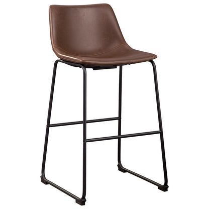 Angled view highlighting the stool's profile, rich faux leather texture, and integrated footrest.