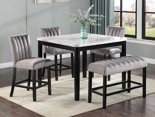 Front-facing view of a single bar stool, clearly showcasing its channel-tufted back, upholstered seat, and black legs with an integrated footrest.