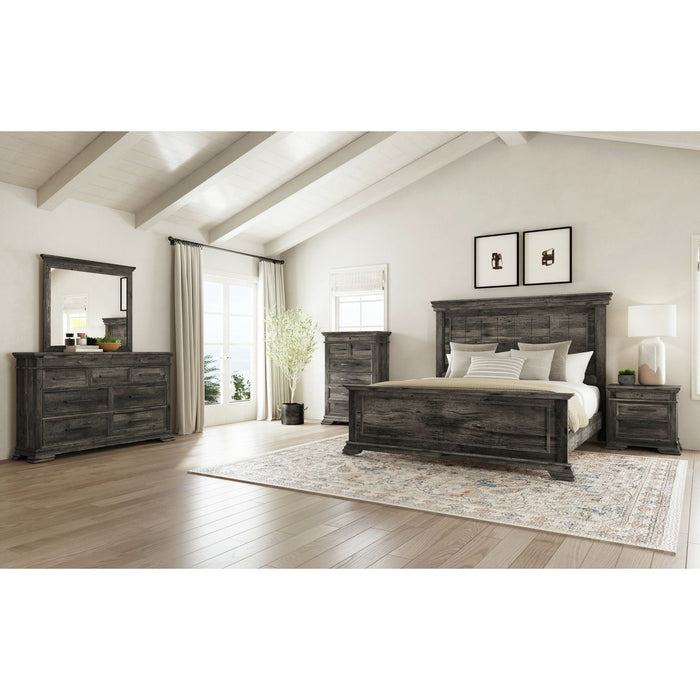 Full view of the Elements International vertical mirror, showcased with a matching distressed gray wood dresser and complementing bedroom furniture in a rustic-style room.