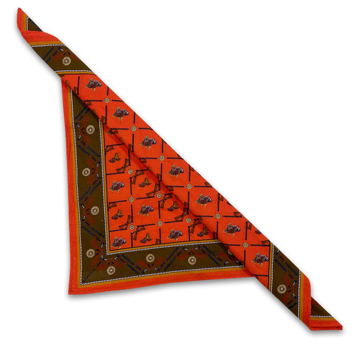 Orange and olive 100% cotton dinner napkin featuring a quail and shotgun hunting pattern in a 22-inch square design.