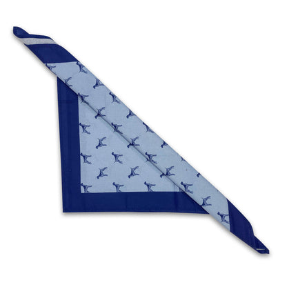 Blue 22-inch cotton dinner napkin featuring a bird dog pattern with a solid navy border, folded diagonally.
