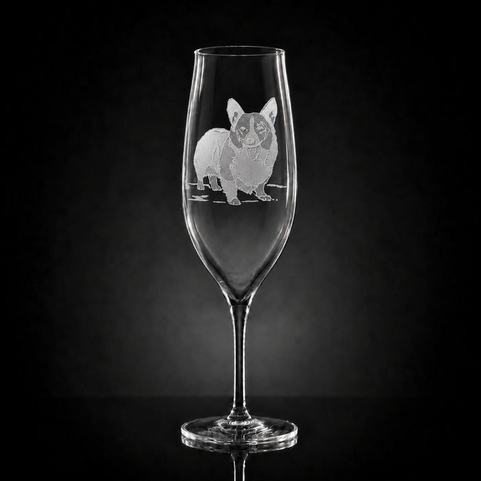 9.5 oz crystal champagne glass featuring a hand-carved, multi-layered sand-etched Corgi design on a black background.