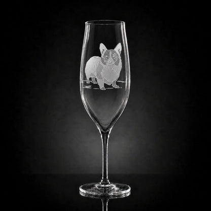 9.5 oz crystal champagne glass featuring a hand-carved, multi-layered sand-etched Corgi design on a black background.