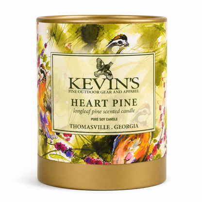 Kevin's Heart Pine soy candle in a decorative container featuring colorful bird and floral watercolor illustrations.