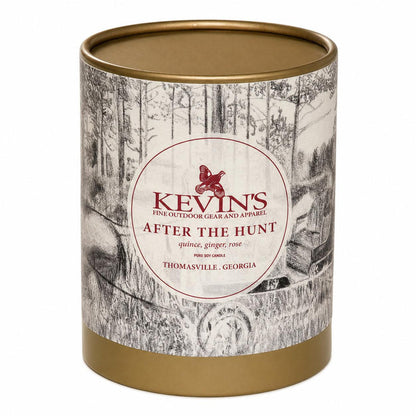 Kevin's After The Hunt soy candle in a cylindrical container with a gold lid and a black-and-white forest illustration.