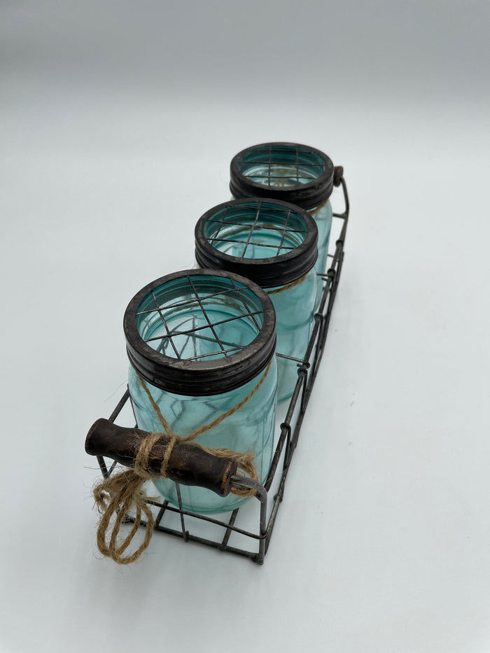 SET OF 3 BLUE GLASS JARS IN WIRE BASKET