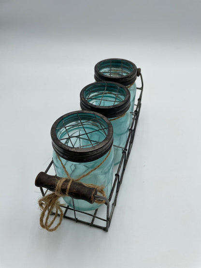 SET OF 3 BLUE GLASS JARS IN WIRE BASKET