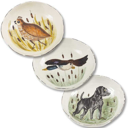 Three hand-painted 8.5-inch Tuscan ceramic pasta bowls featuring whimsical wildlife motifs of a bird, duck, and dog.