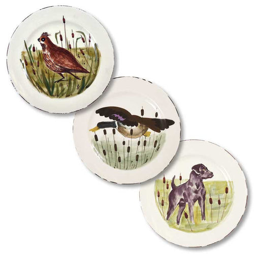 Set of three 8.5-inch hand-crafted Tuscan salad plates featuring quail, mallard, and hunting dog designs on cream ceramic.
