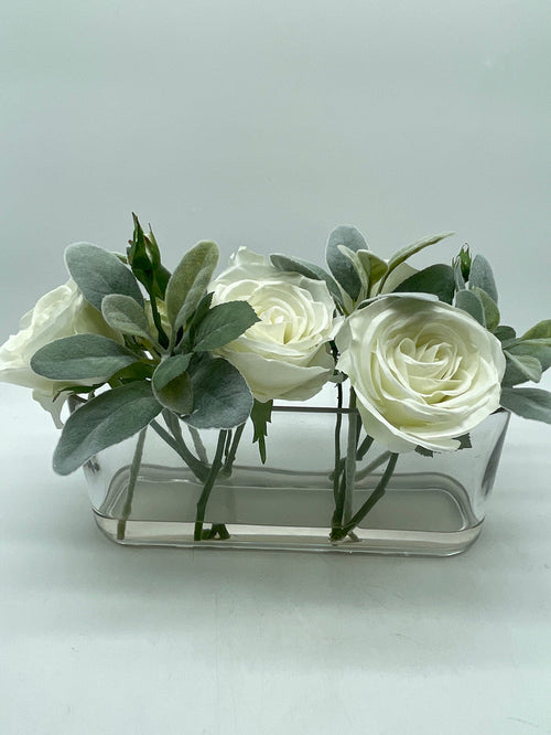WHITE ROSES  IN OVAL GLASS VESSEL